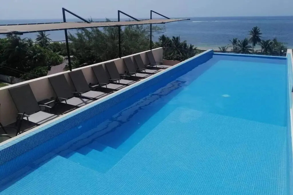 Modern 1 bedroom suite by beach Great location!