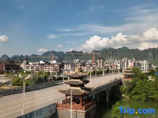 Yeste Hotel (Du'an High - speed Railway Station Binjiang Zhuangyuan Food Street Branch)