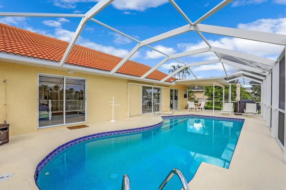 Pet-friendly home with southern exposure and pool