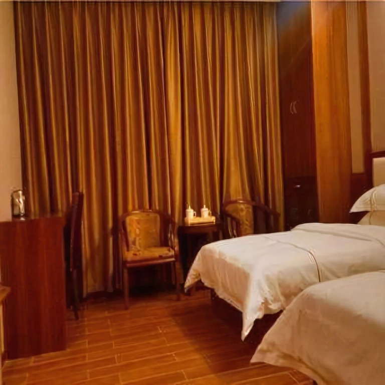 Wenhao Business Hotel (Guangzhou Julong Subway Station)