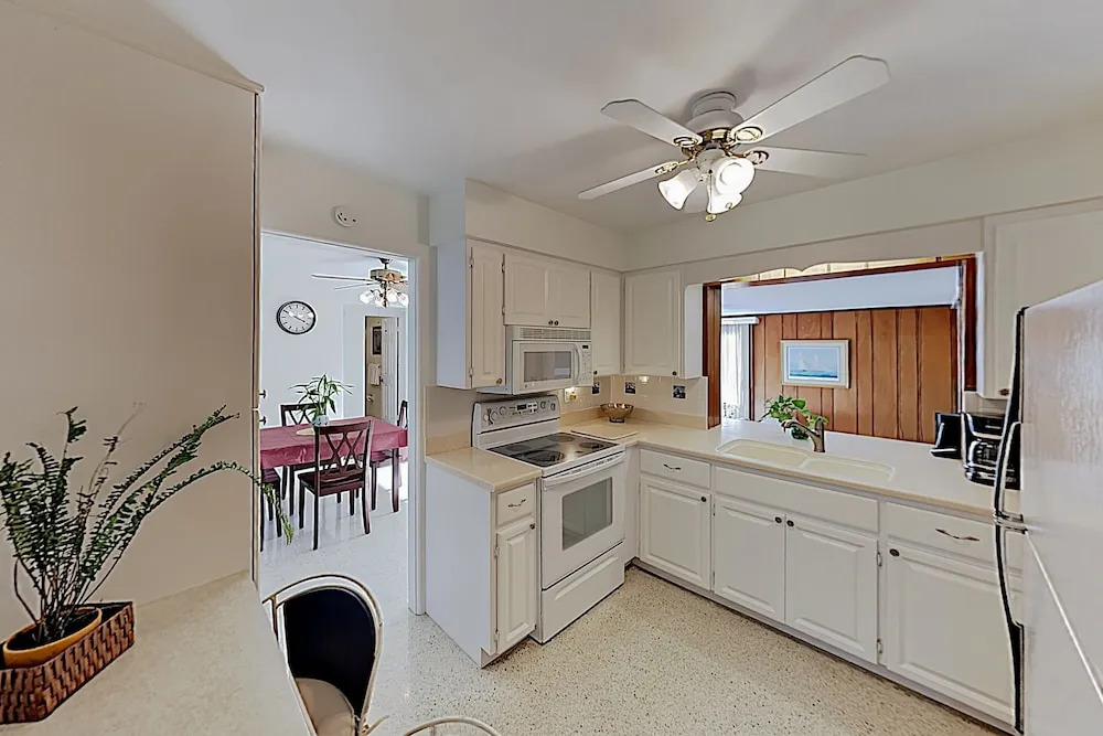 New Listing! Canal-front Escape W/ Private Yard 3 Bedroom Home