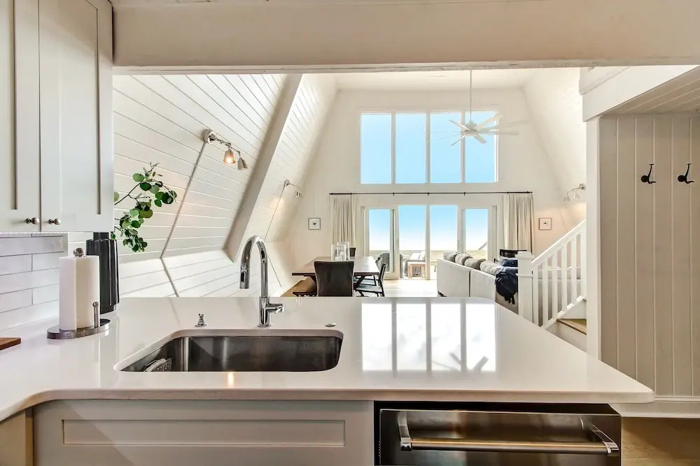 Roomy Chalet-Style Beachfront Condo with Private Beach Access by RedAwning