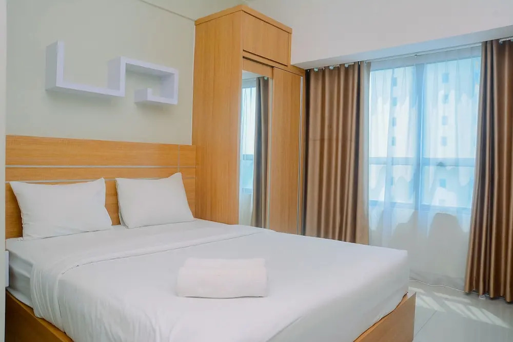 New Furnsihed Studio Room Apartment at Springlake Bekasi By Travelio