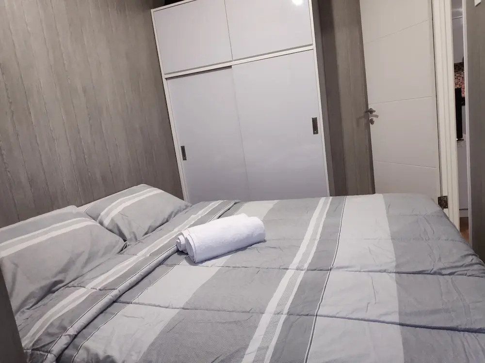 Clean & Comfy Room at Bassura with open view window