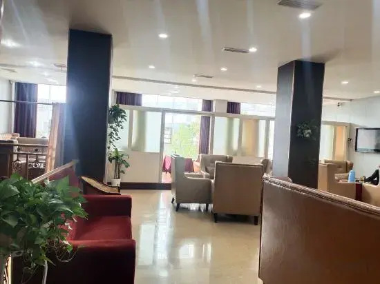 Defu Business Hotel (Yilong Xinzhengzhen Branch)
