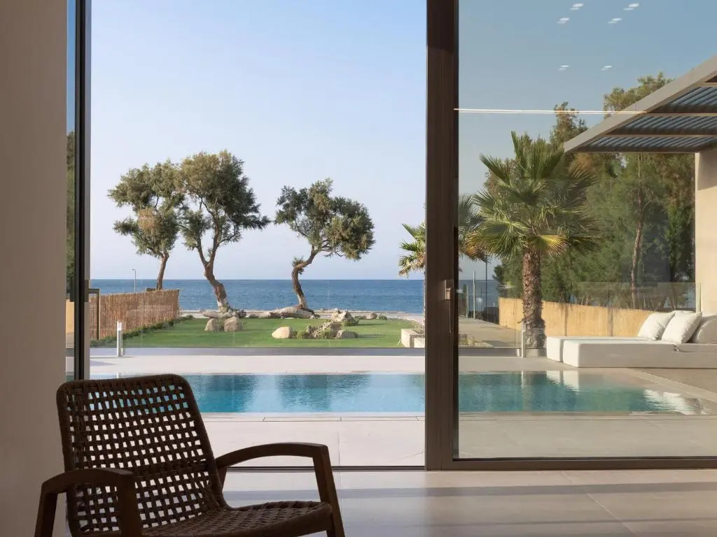 Artemis Villa, Beachfront Retreat with Heated Pool, By ThinkVilla