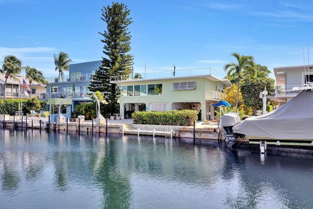Delightful Vacation Home Located In The Popular Islamorada Neighborhood Of Port Antigua. 3 Bedroom Home by RedAwning