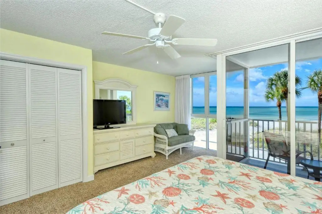 LaPlaya 105B-Relax on the balcony and watch the dolphins swim by and the pelicans dive!