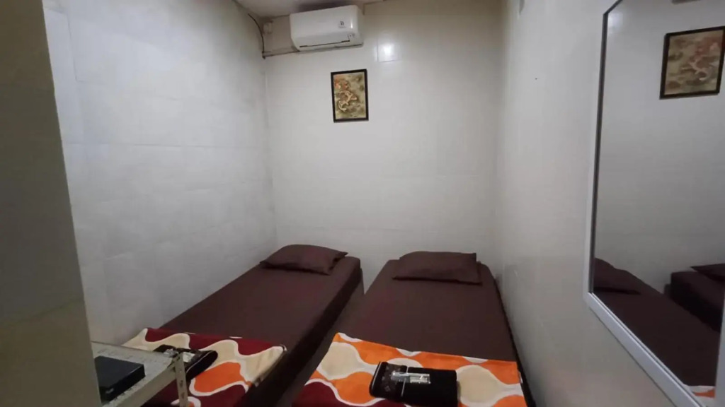 Spot On 3988 Kost Carmelia Baranangsiang Syariah