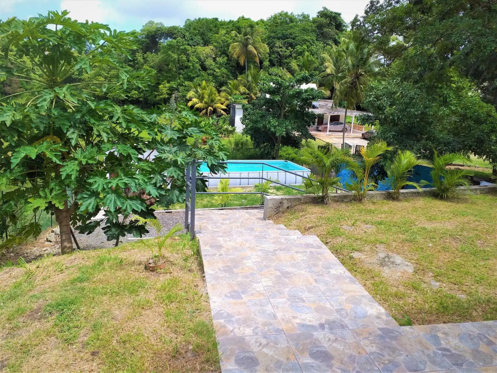 Bungalow d'une chambre avec vue sur la ville piscine partagee et jardin clos a Chateau Gaillard Le Moule a 7 km de la plage