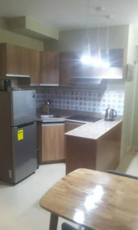 Cozy Studio Unit near Manila Airport With Swimming Pool, Full Kitchen 7A