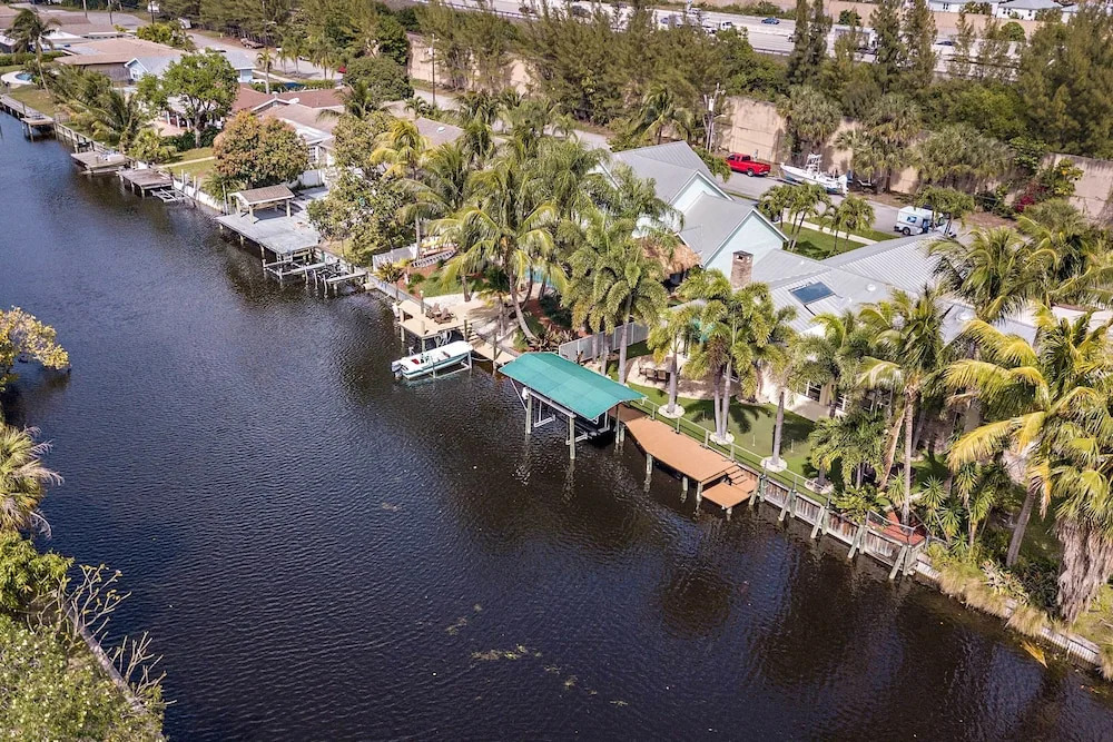 Sunny Waterfront Home by West Palm w/ Hot Tub!