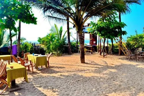 Pele's Windsong Wood Cottage on the beach