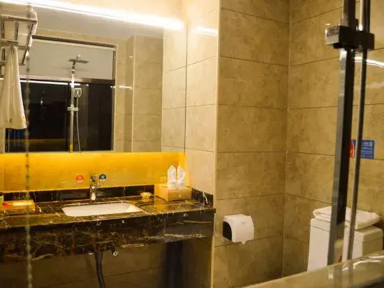 Mangshi Huayou Business Hotel