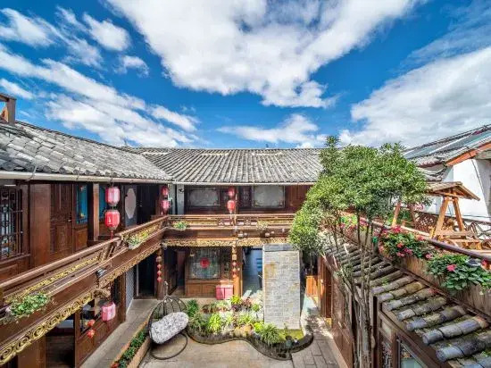 Old Town of Lijiang Big Waterwheel · Yimeng Chenfeng Rizhao Jinshan Snow Mountain Scenic Inn