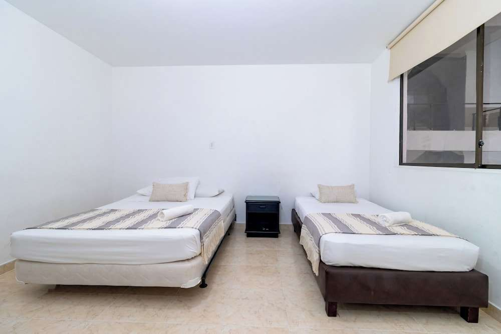 Hotel Axis Inn By GEH Suites