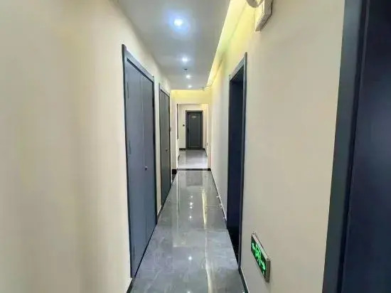 Xinle Shengjin Hotel