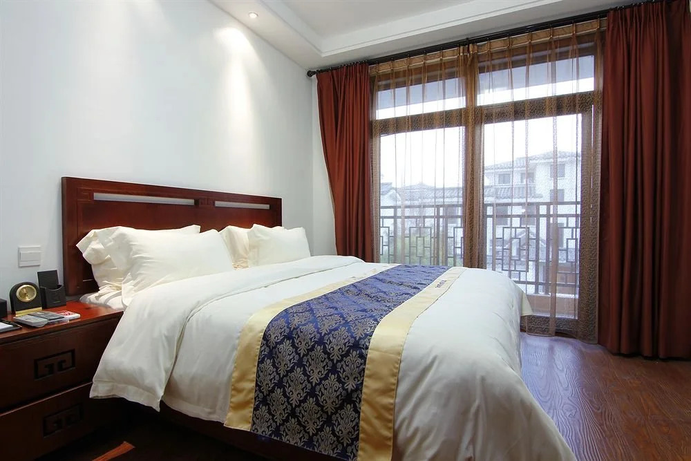 Linyi Tujia Sweetome Vacation Rentals