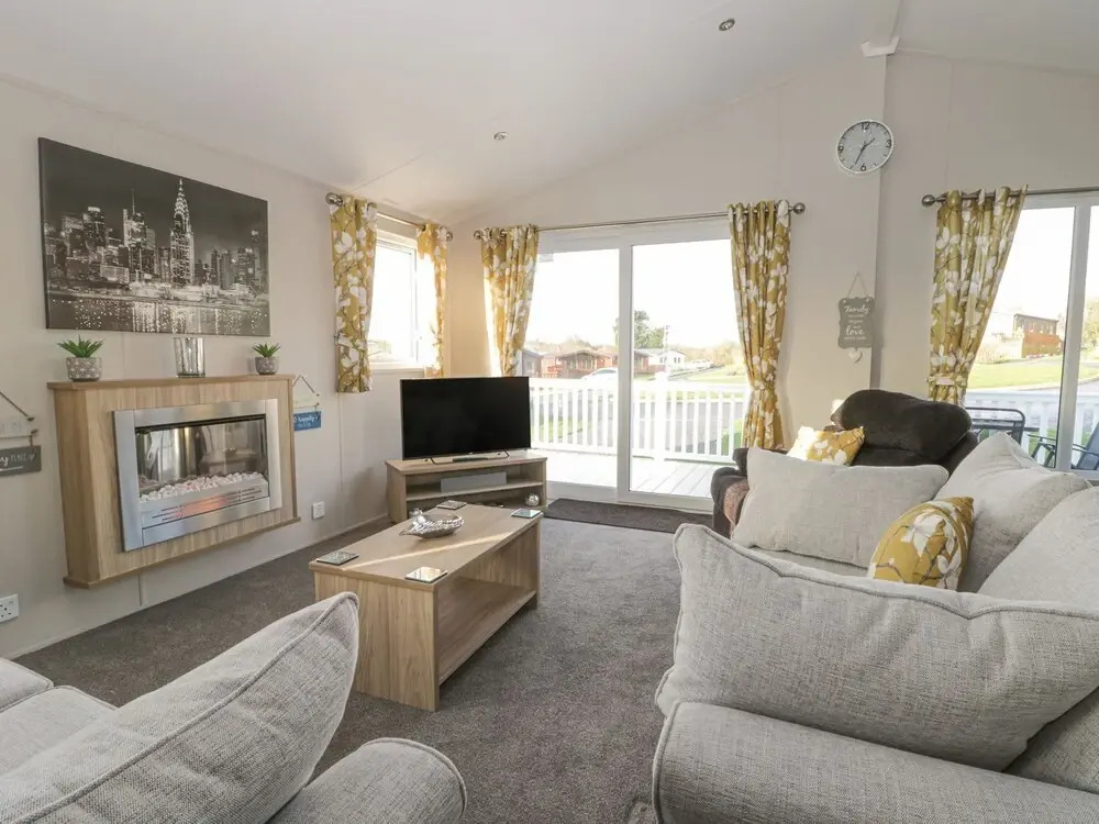 Stylish Lodge set in the Sand le Mere Holiday Park