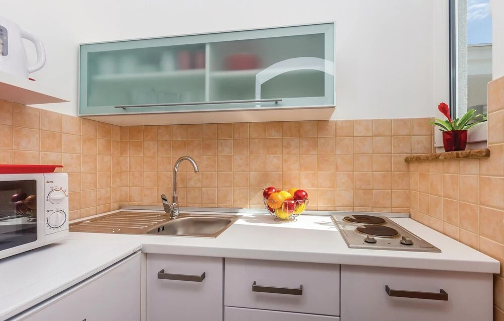 Nice Home in Njivice with Hot Tub, WiFi & 1 Bedrooms