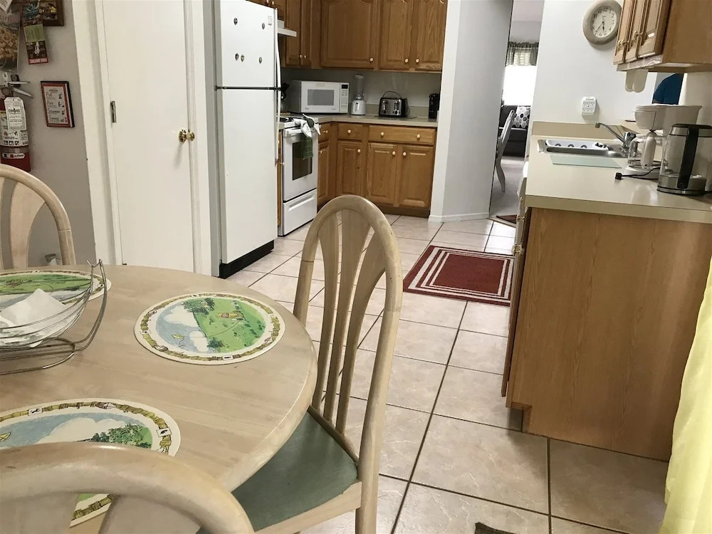 3 Bedroom Home With Private Screened Pool With Rock Waterfall Feature and Gameroom by Florida Dream Homes