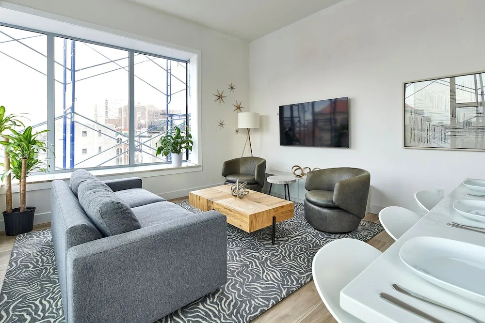 Bright Designer Loft Steps From Path to NYC