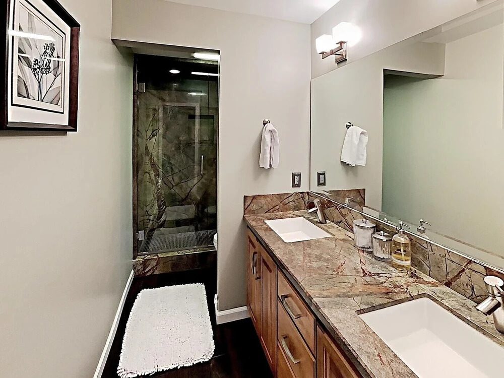 DELUXE SLOPESIDE Condo with 4th FLOOR VIEWS, Elevator and Underground Parking at Canyon Lodge (1849 Condos 409) by RedAwning