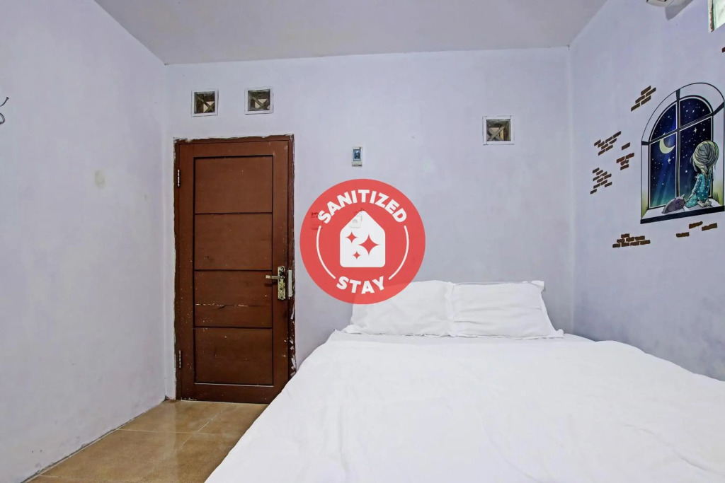 SPOT ON 91506 Guest House Putri Raja