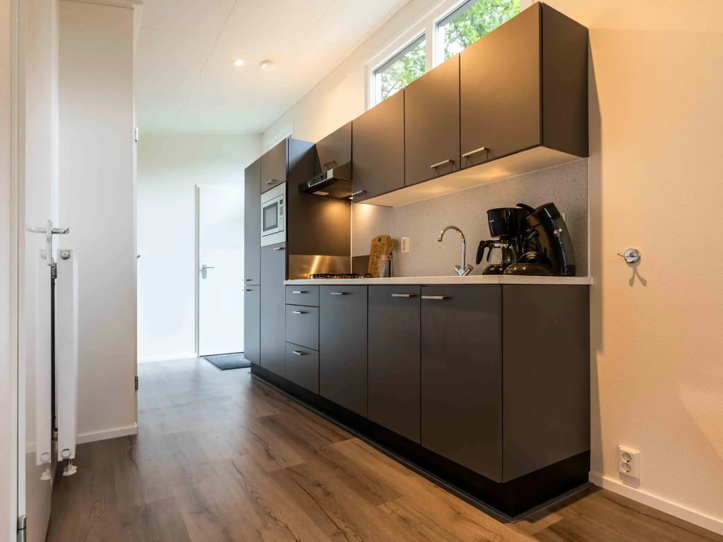 Nice chalet with dishwasher in a holiday park in the middle of the Veluwe