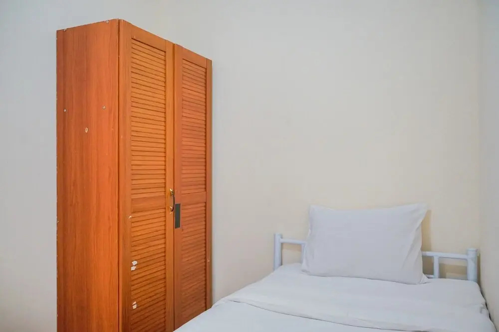 Homey and Simple 2BR at The Medina Apartment