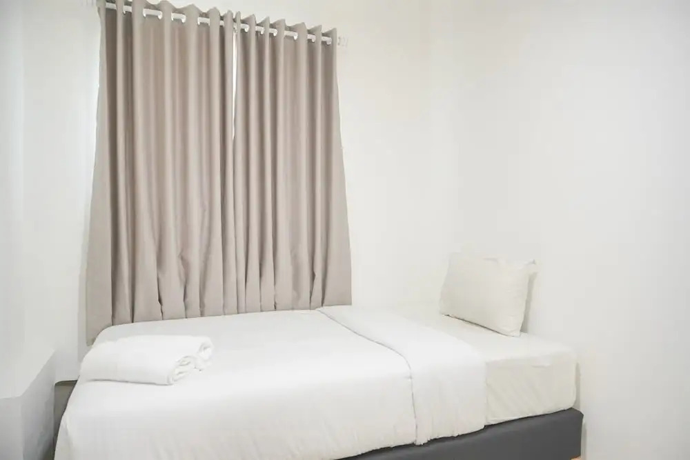 Modern And Homey 2Br At Mt Haryono Square Apartment