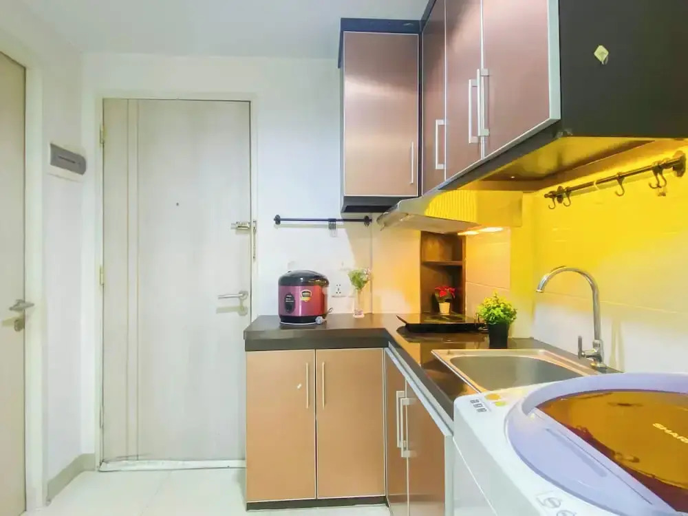 Simple 2Br At Azalea Suites Apartment