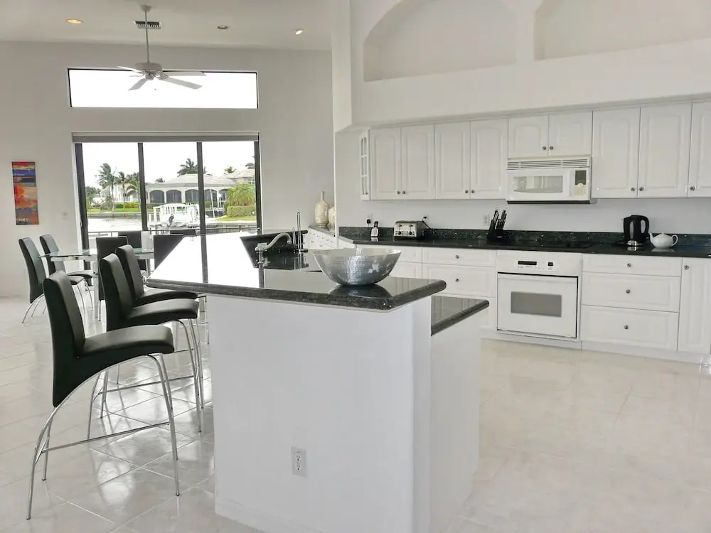 Waterfront home on key lot with pool, spa and views