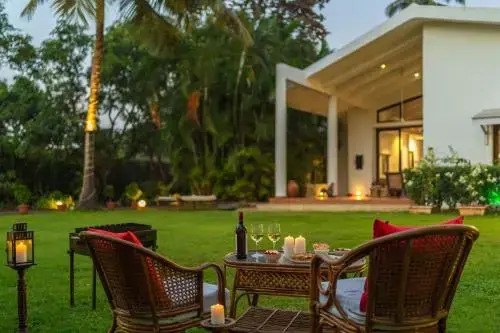 The Beach House by StayVista with Modern interiors, nearby beach, pool, lawn