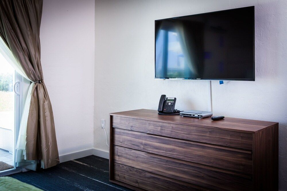 The Salty Mermaid Oceanfront Hotel