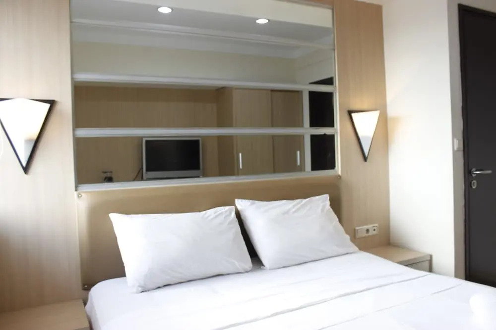 Newly Renovated 3BR with Smart TV Braga City Walk Apartment By Travelio