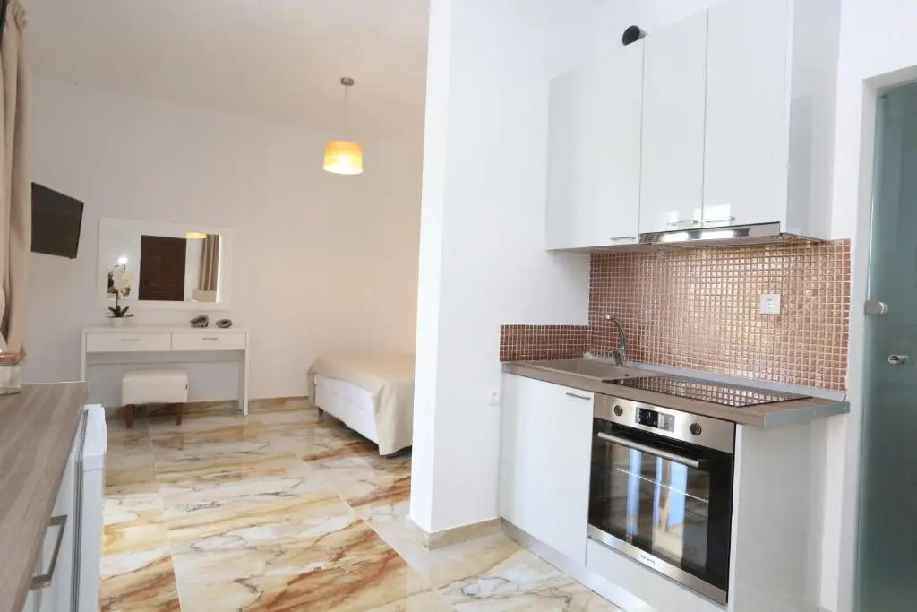 PLACE DES DIEUX lux villas with swimming pool CHROUSSO BEACH near