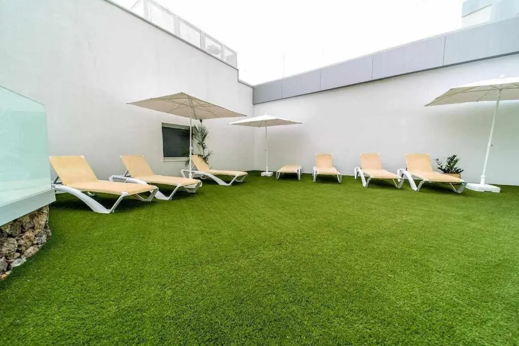 Ocean Garden Suite 11 con jardín privado