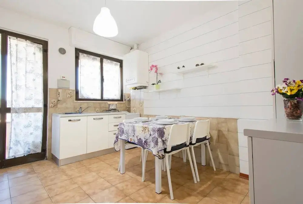 ALTIDO Lovely 1BR flat with patio and parking