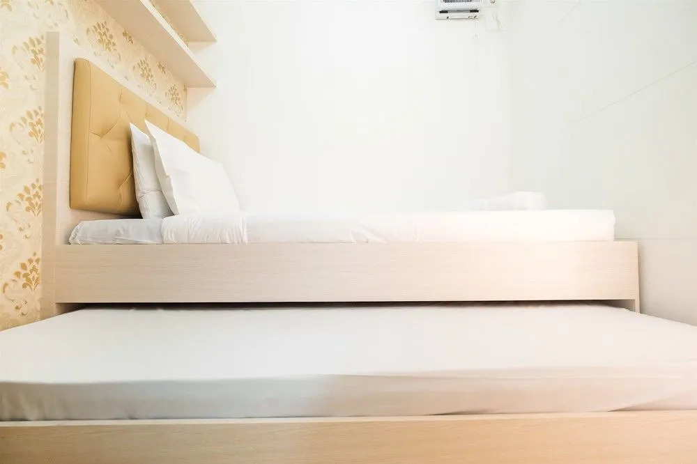 2 Bedrooms at Bassura City Apartment with Mall Access By Travelio
