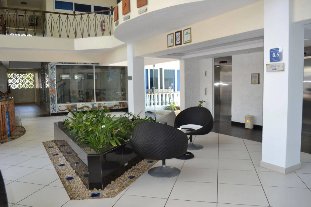 Cowrie Shell Beach Apartments Official