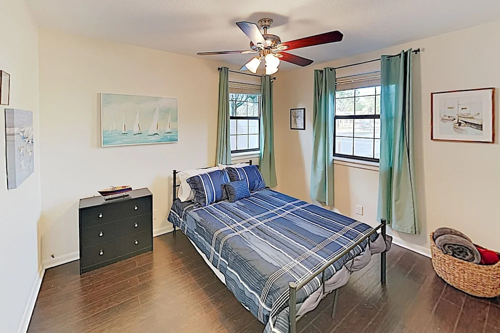 Updated W/ Gated Pool & Screened-in Porch 4 Bedroom Home