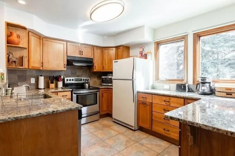 Townhome with Covered Parking Space & Fireplace by RedAwning