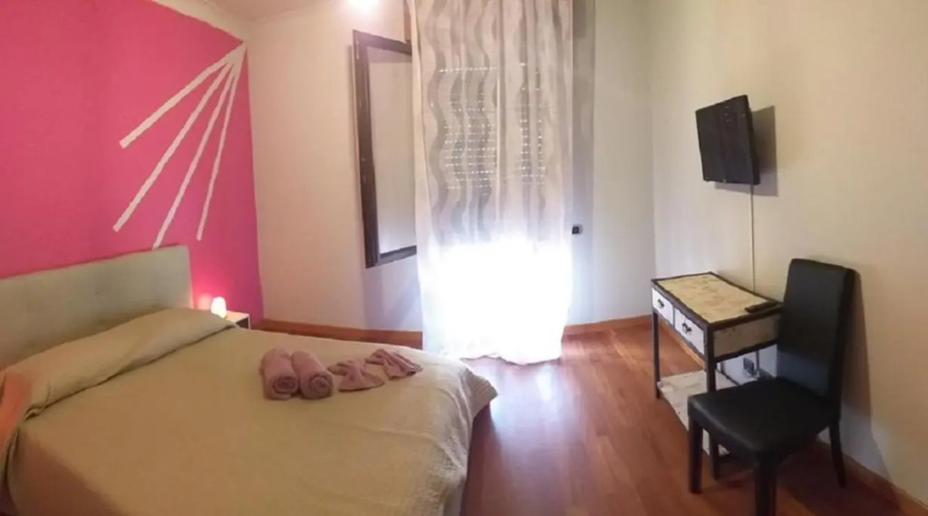Room in Guest Room - Camera Rosa Appartamento Quadrifoglio