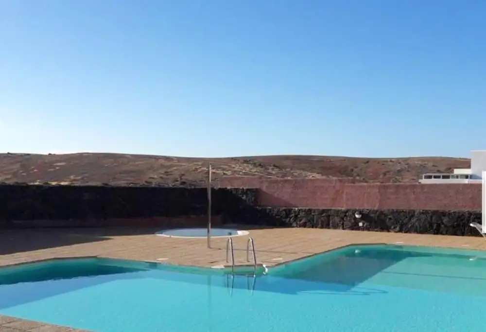 House With 3 Bedrooms in Playa Blanca, With Wonderful sea View, Shared Pool, Enclosed Garden Near the Beach