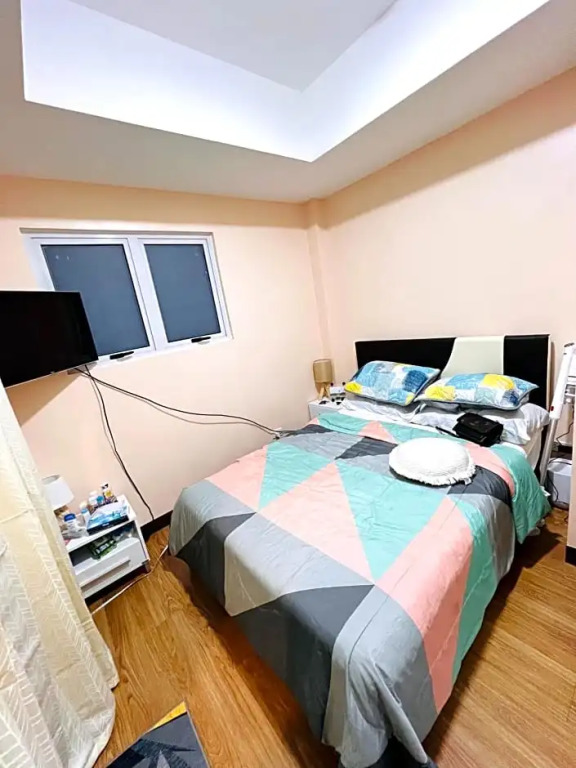New Cozy 2 bedroom unit condotel for staycation with living room and kitchen set with pool