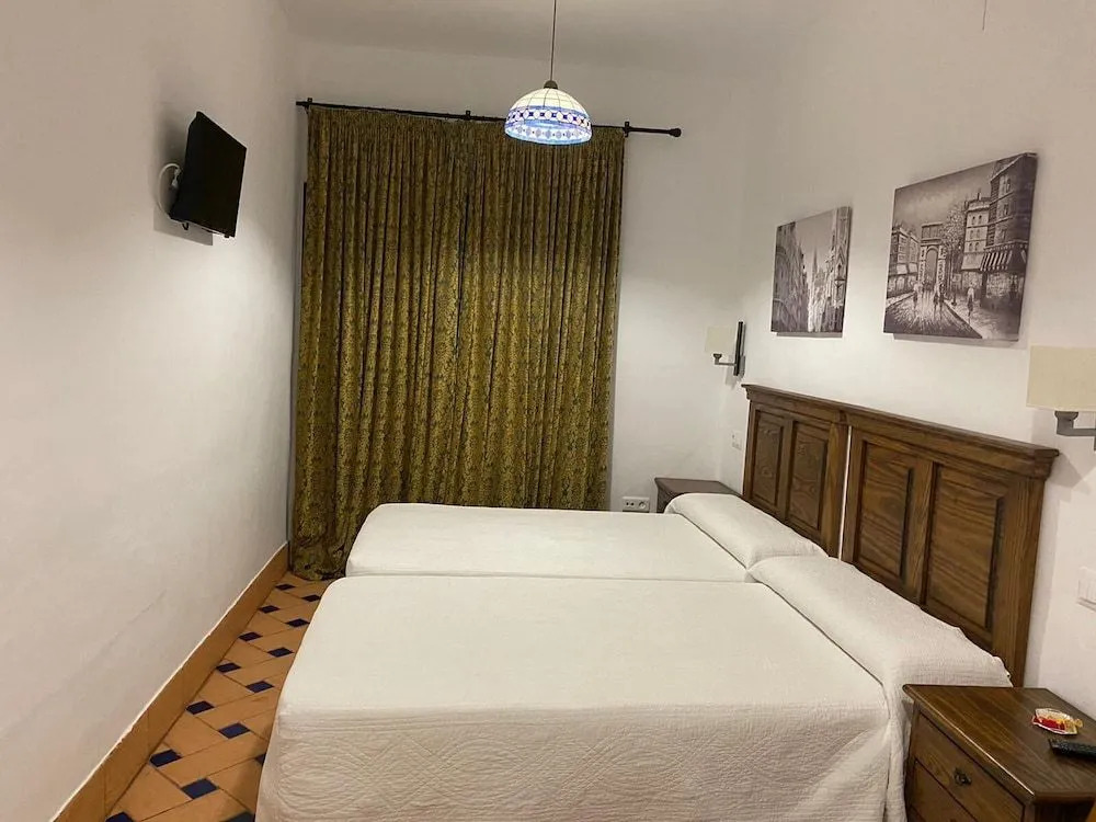 Apartamentos Turísticos - Hostal Los Alisos