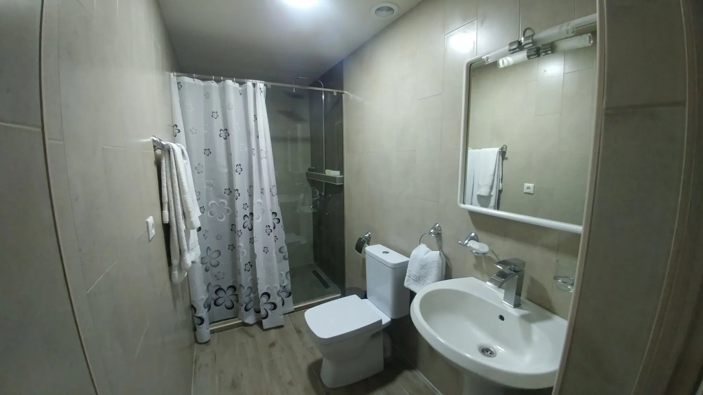 Отель Cross Apartments and Tours