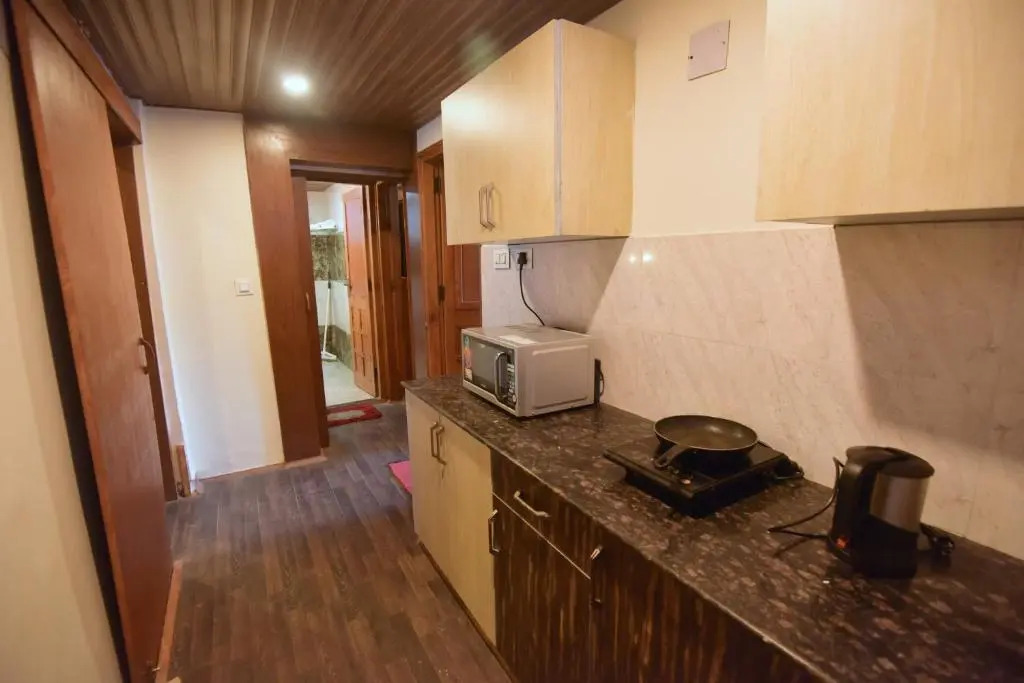 Swiss Cottage by Dumnu Homes next to Kangna Ranaut's house
