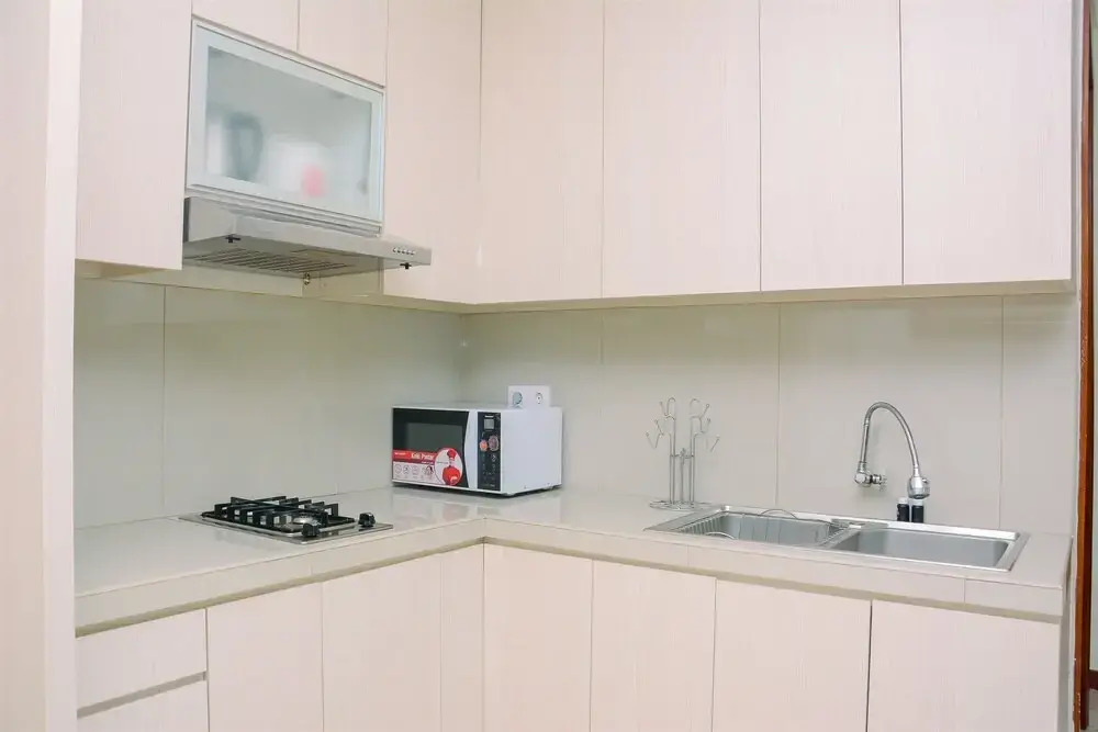 Homey and Posh 2BR Apartment at Green Bay Pluit By Travelio